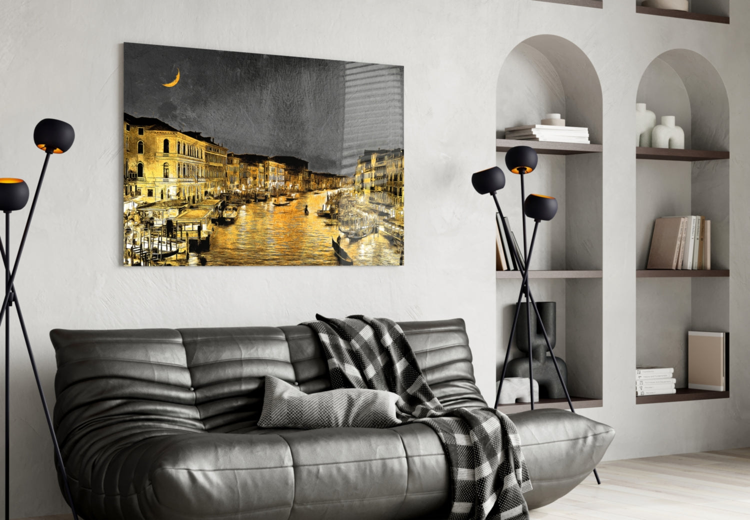 Venetian Glass Wall Art depicting a golden-lit nighttime canal scene with buildings and crescent moon, displayed above a black leather sofa in a modern living room.