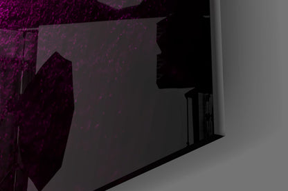 Dark silhouette of glass wall art installation against purple textured wall with interior doorway visible.