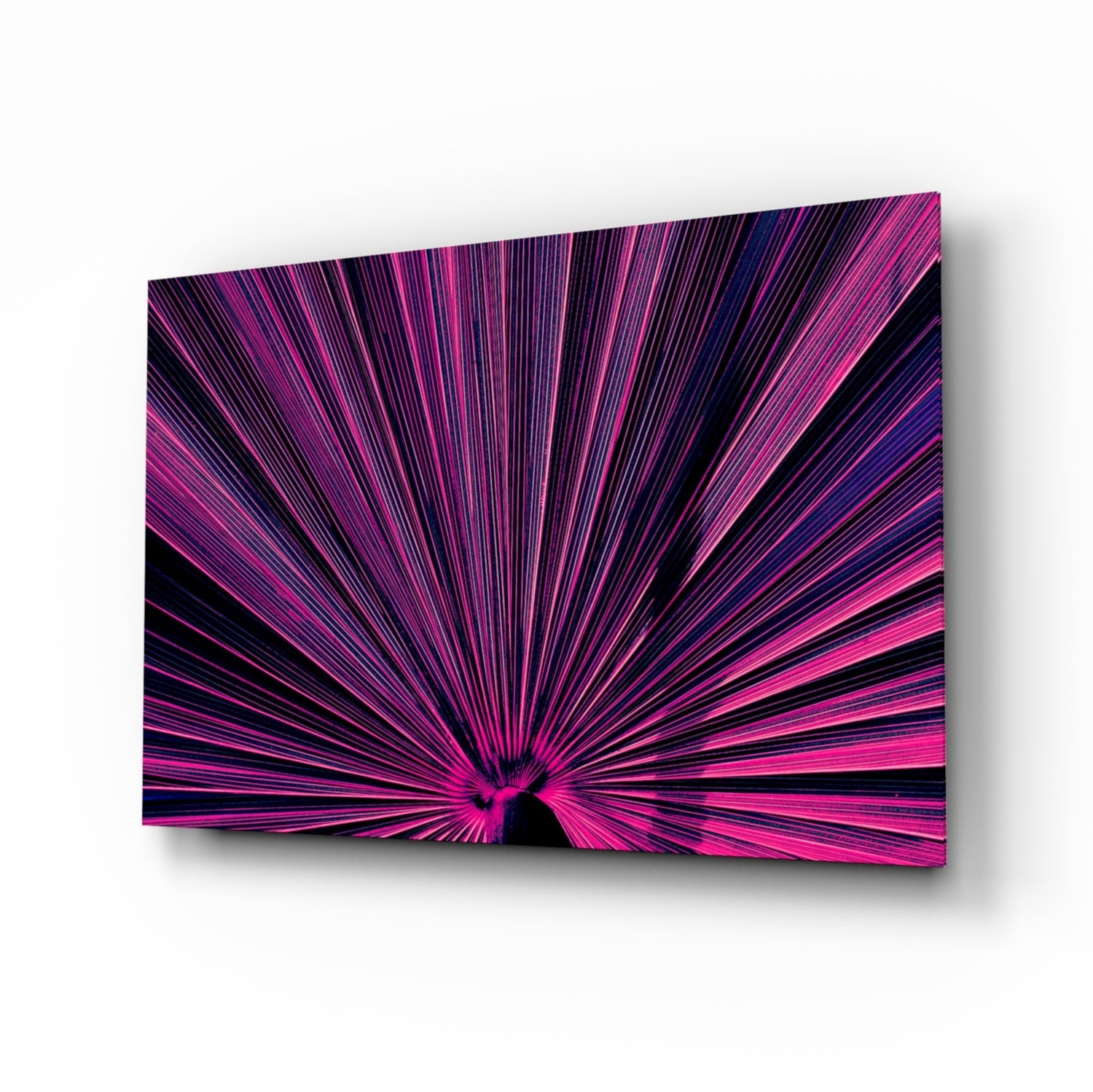 Vibrant pink and purple radiating lines converge at center on glossy glass panel against white background.