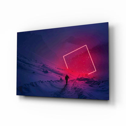 Glass wall art panel displayed at angle showing silhouetted figure in snowy landscape beneath neon pink rectangle against blue-purple gradient sky.