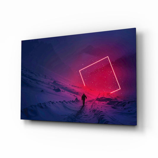 Glass wall art panel displayed at angle showing silhouetted figure in snowy landscape beneath neon pink rectangle against blue-purple gradient sky.