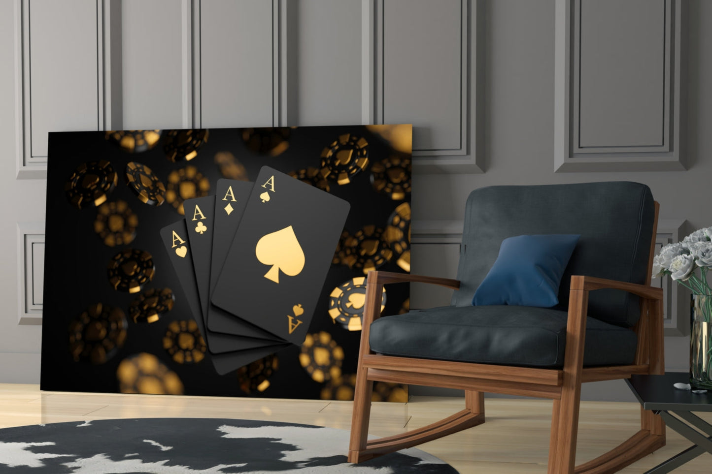 Black glass wall art displaying four gold aces and scattered gold poker chips against dark background, installed in modern living room setting.