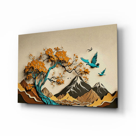 Angled perspective of layered glass wall art depicting an orange tree with teal birds flying toward snow-capped mountains against a cream background.