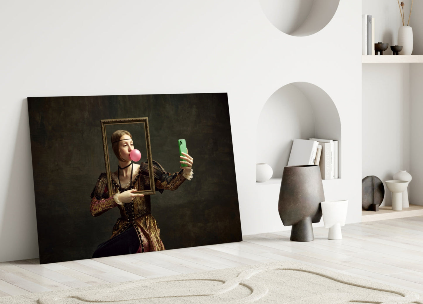 Modern art glass panel leaning against white wall showing classical portrait figure holding mirror and green phone with pink bubble gum.