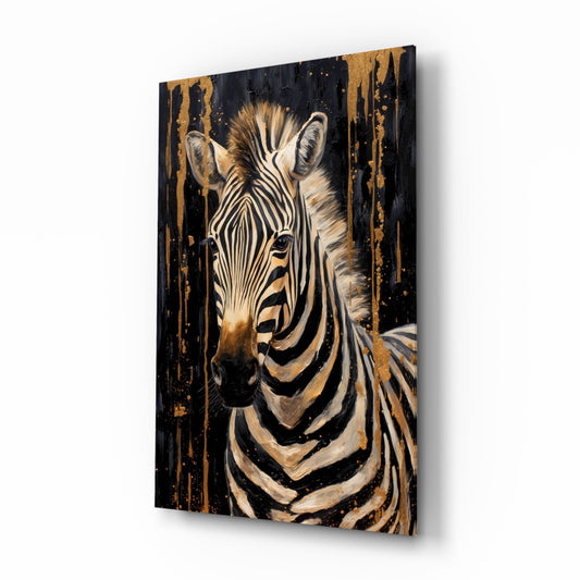 Angled side view of a zebra portrait glass wall art with gold leaf accents and black drip effects on dark background.