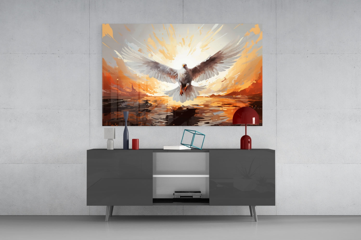 Pigeon glass wall art with golden-orange landscape and white dove displayed above dark gray media console in modern interior setting.