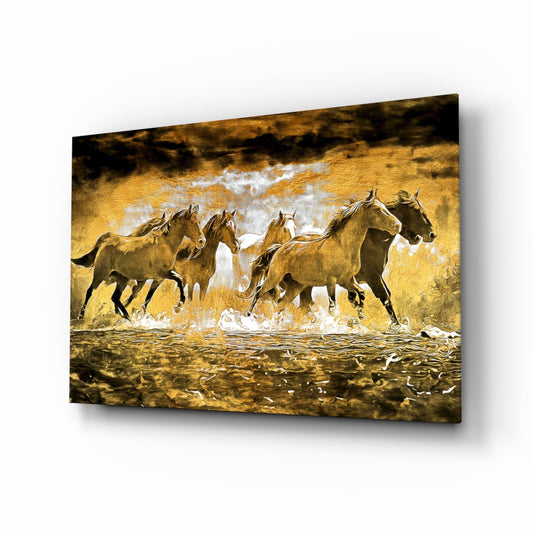 Angled product view of golden glass wall art depicting horses running through water with white splashes and dark textured background.