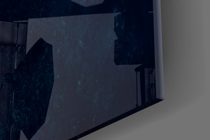 Close-up angled view of textured dark teal glass wall art with dimensional geometric cutouts, mounted on white wall.
