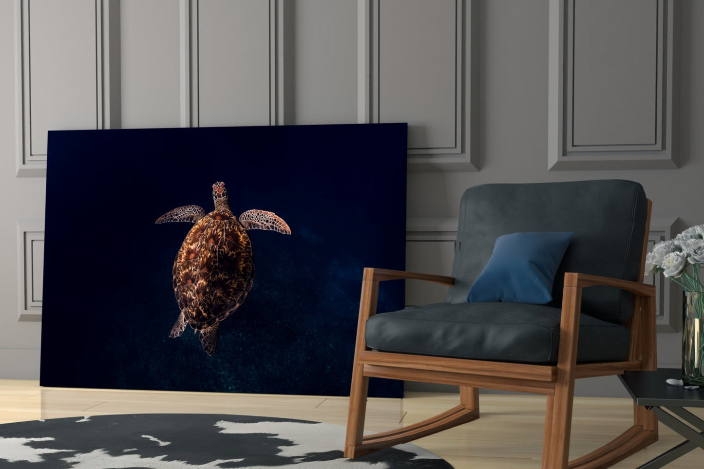Sea turtle glass wall art displayed in modern living room with wooden chair and dark leather cushions.