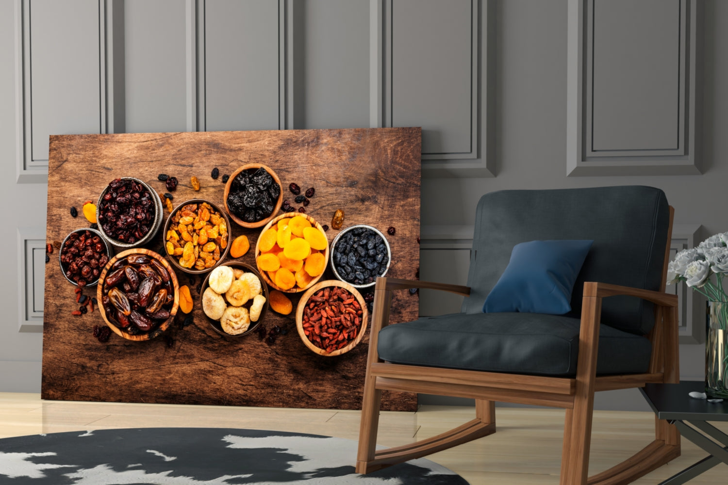 Nuts Cocktail Glass Wall Art displayed leaning against paneled wall beside wooden rocking chair with black leather seat and blue cushion.