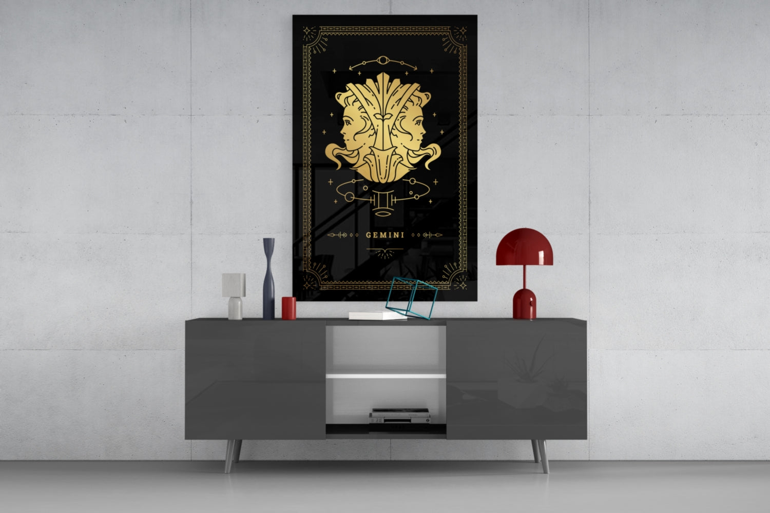 Gemini zodiac glass wall art displayed above gray sideboard with red lamp and decorative accessories in modern interior setting.