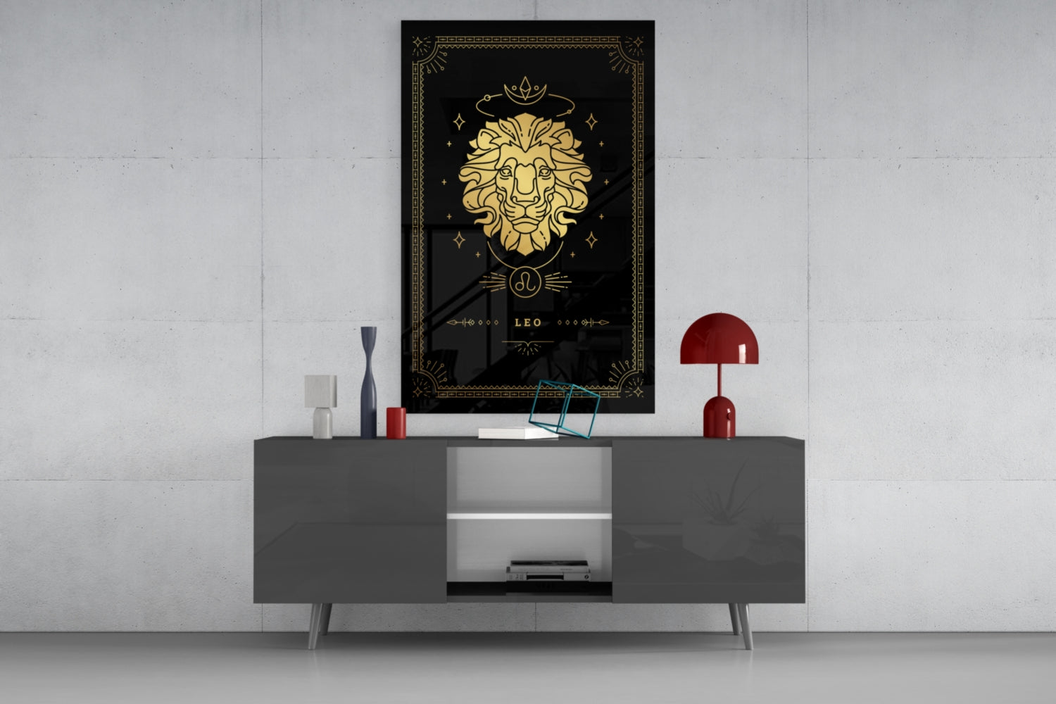 Leo zodiac glass wall art with gold lion and black background displayed above gray console table with red lamp and decorative accessories.