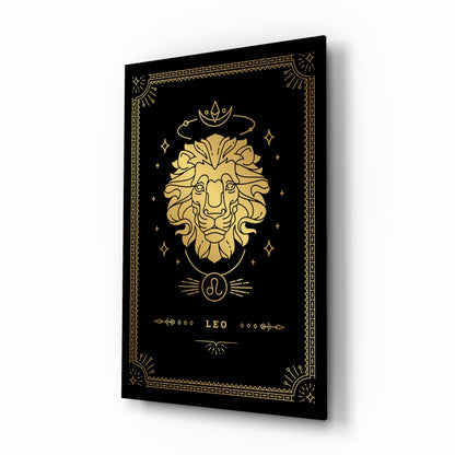 Black glass panel with gold Leo zodiac lion head design, celestial symbols, and decorative border, angled three-quarter view.