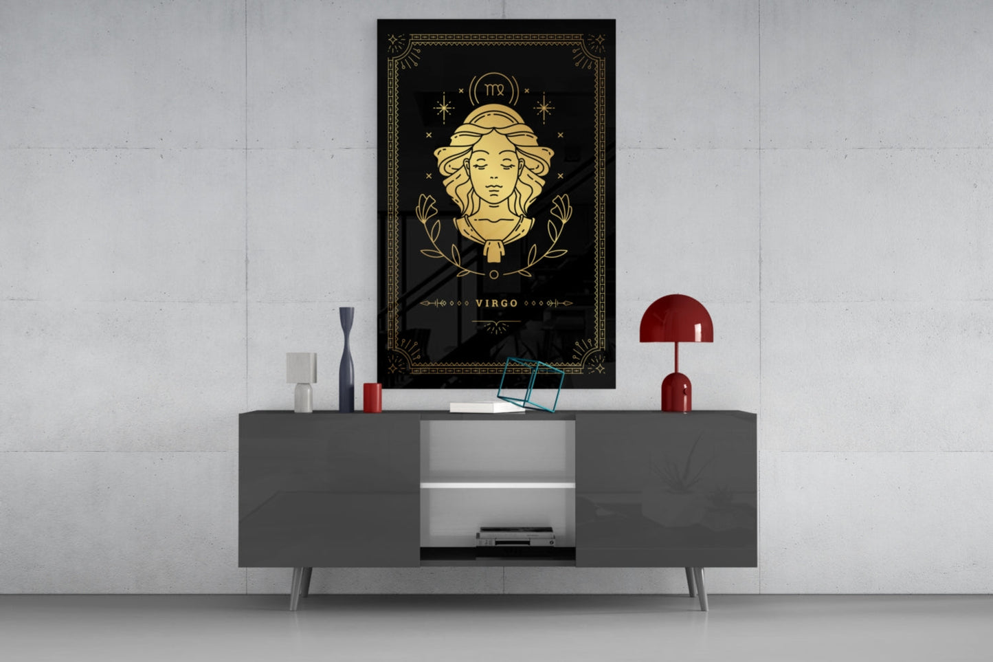 Virgo zodiac glass wall art featuring gold line illustration on black background, displayed above gray console table with red lamp and decorative objects.