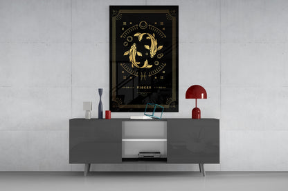 Black glass Pisces zodiac wall art with gold fish design displayed above gray media console with red lamp and decorative accessories.
