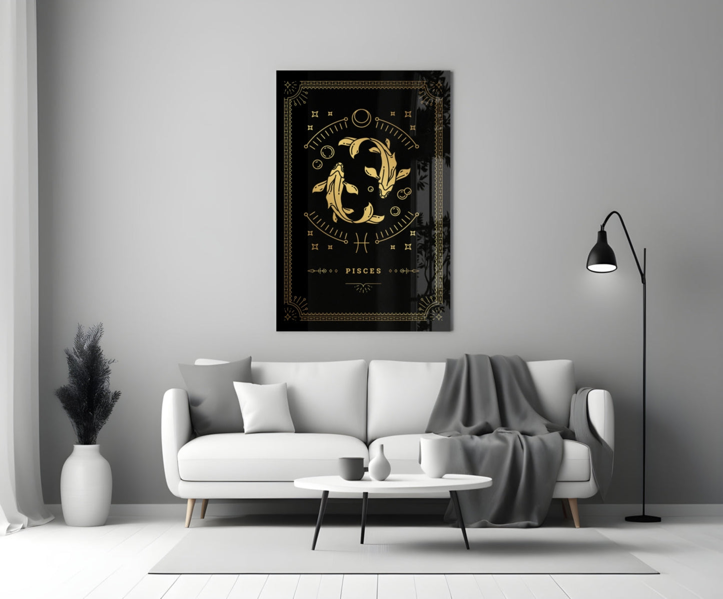Black glass Pisces zodiac wall art with gold fish design displayed above white sofa in modern living room.