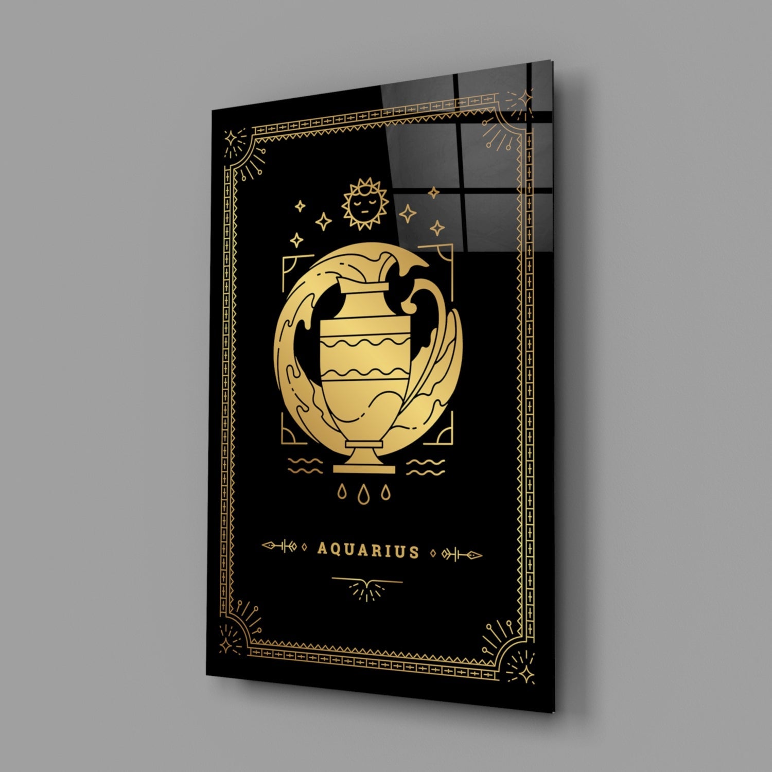 Black glass wall panel with gold Aquarius zodiac symbol, urn illustration, sun, stars, and decorative geometric border, angled perspective view.