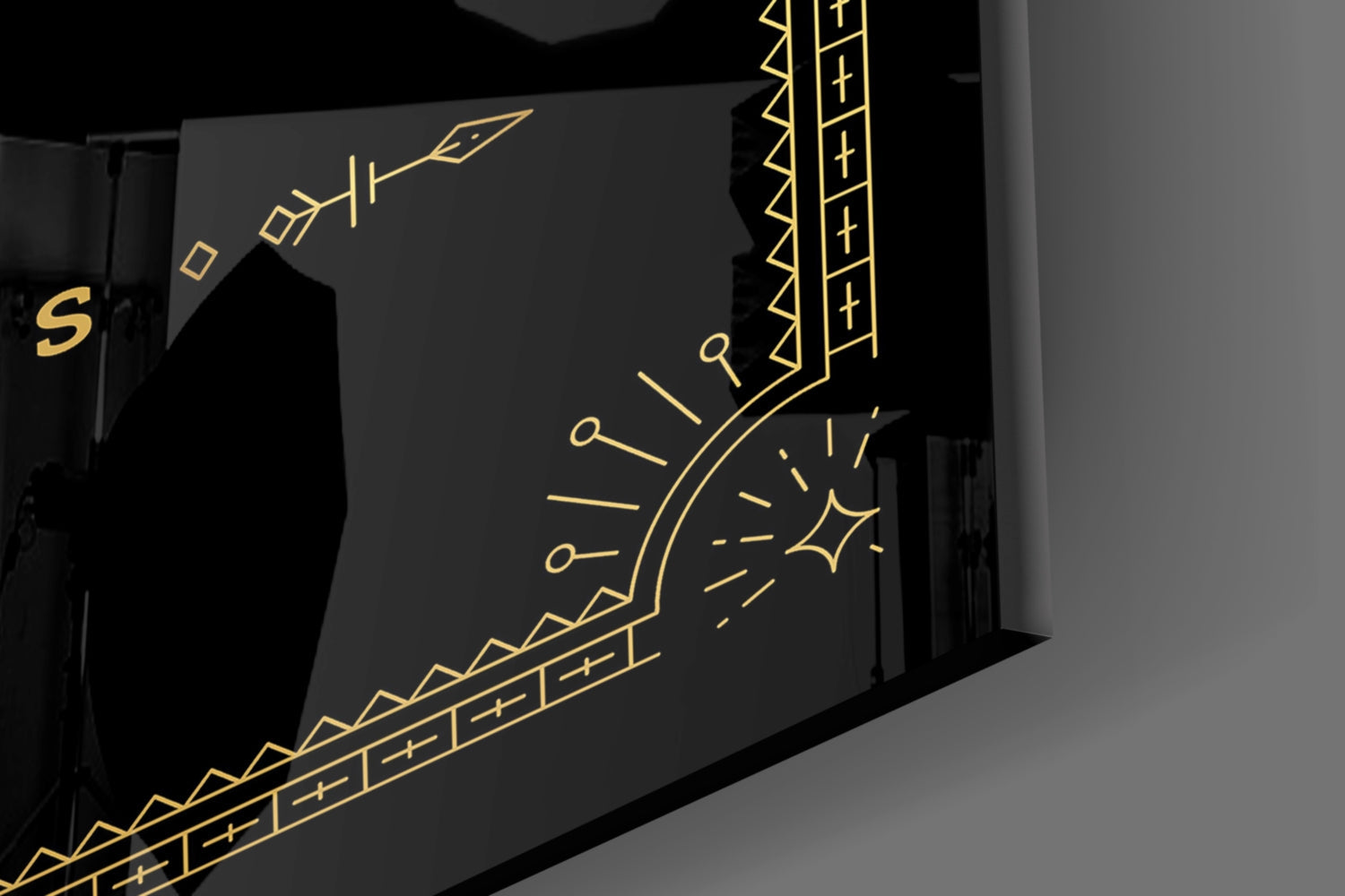 Black glass wall art panel with gold line-drawn Aquarius zodiac symbol and decorative geometric patterns, angled three-quarter view.