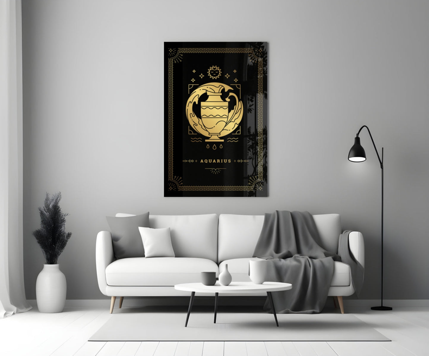 Black glass wall art with gold Aquarius zodiac symbol and decorative border displayed above white sofa in modern living room.