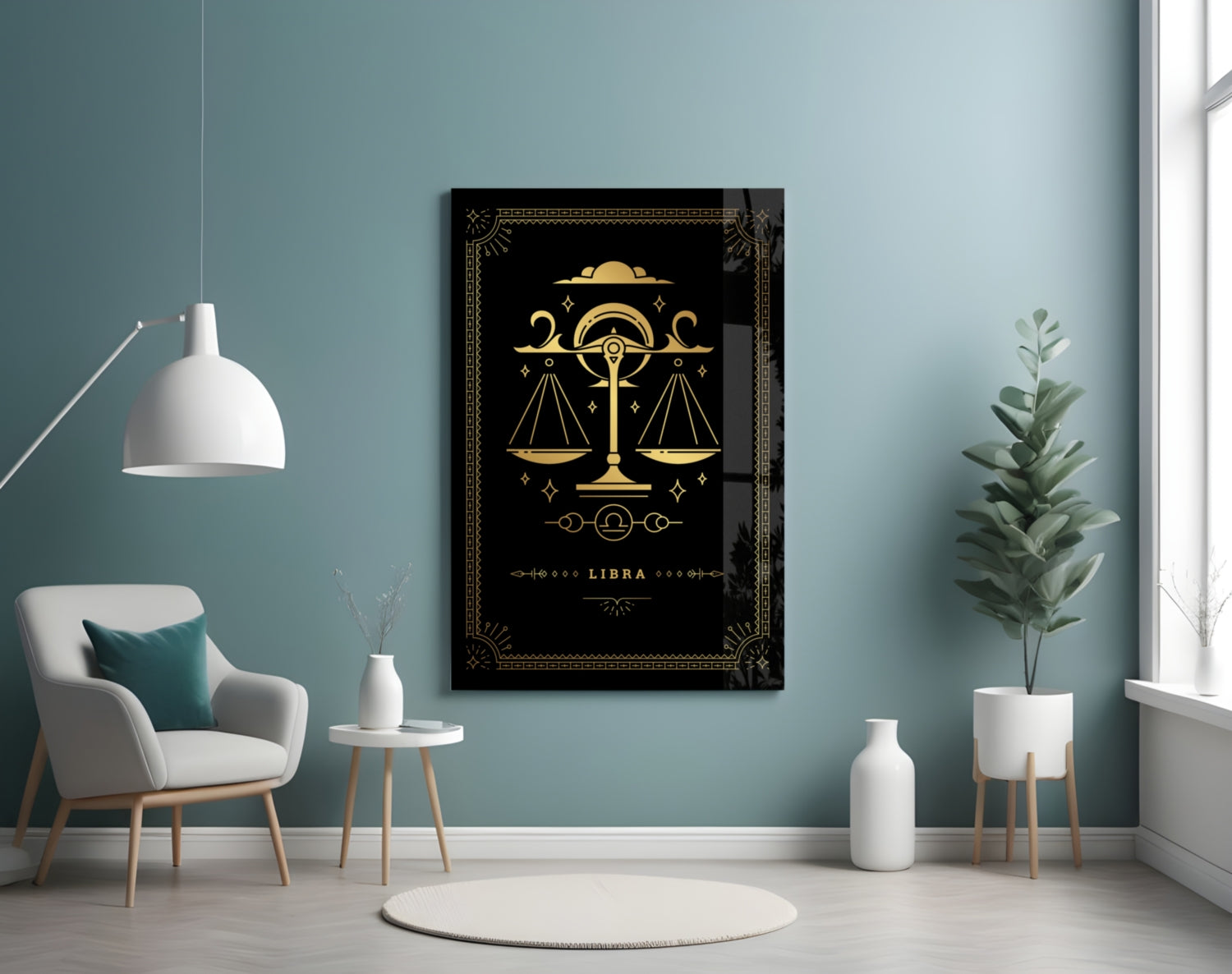 Libra zodiac glass wall art with gold scales on black background displayed in modern living room with teal walls, white chair, and potted plants.