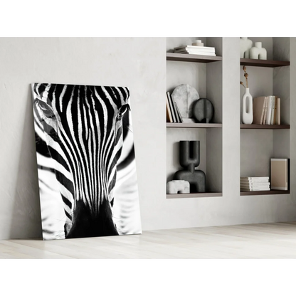 Black-and-white zebra face glass wall art canvas print on wall