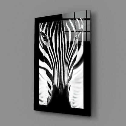 Bold black and white zebra portrait glass wall art in black frame