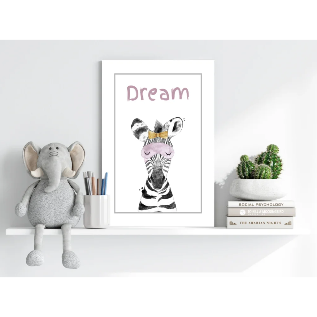 Zebra print dream poster with pink text in white frame on shelf