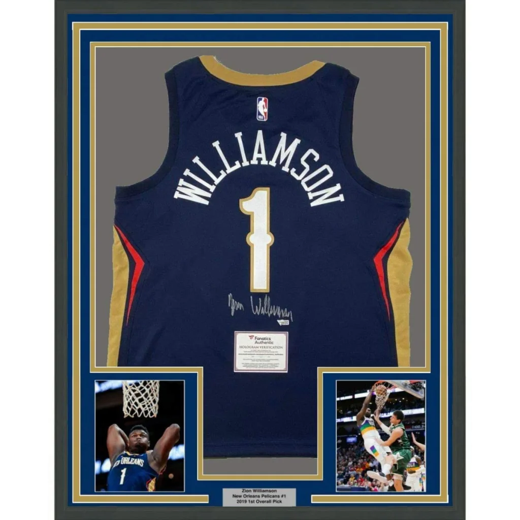 Autographed Zion Williamson Pelicans jersey with player photos and authenticity certificate