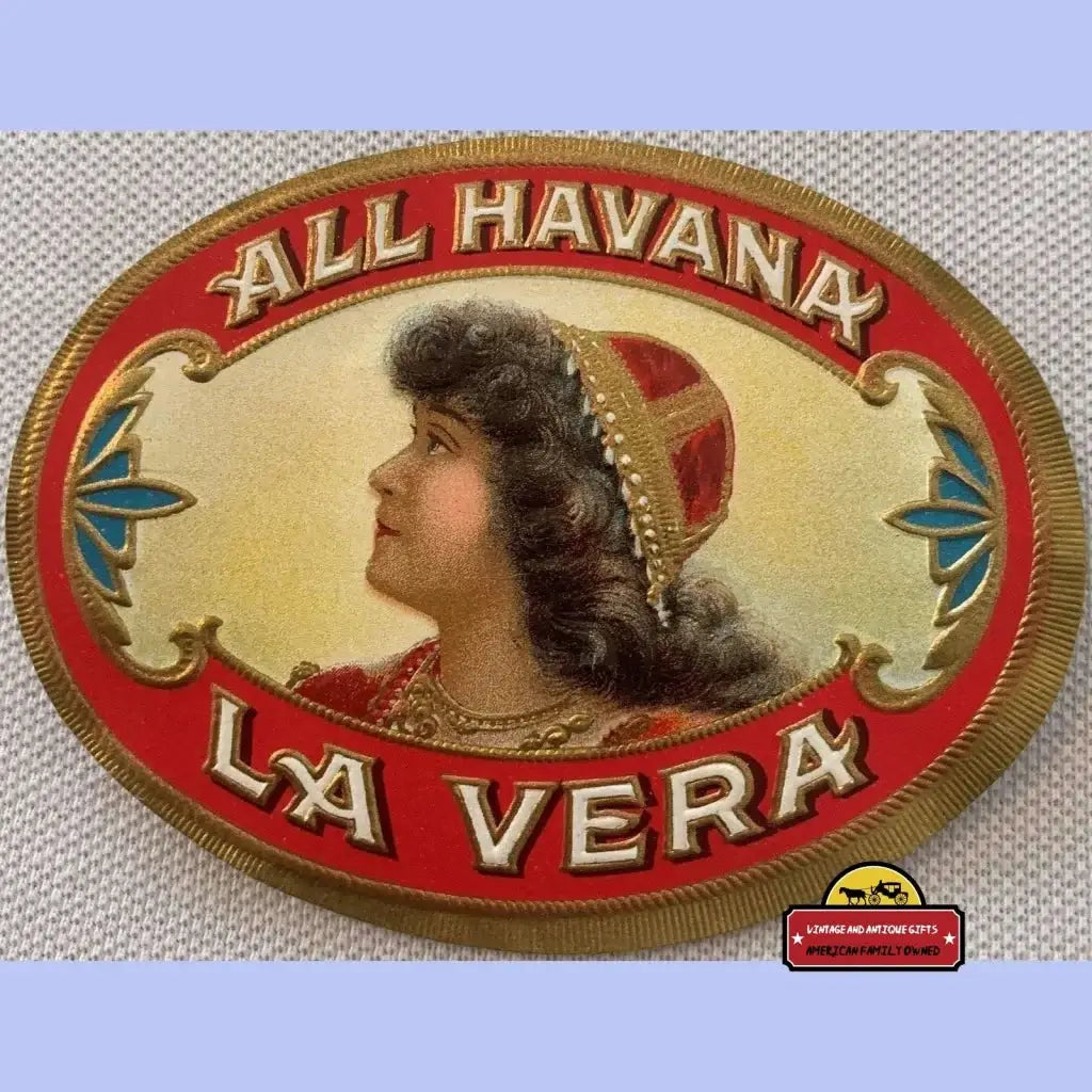 Vintage cigar label with red gold womans profile and All Havana La Vera text
